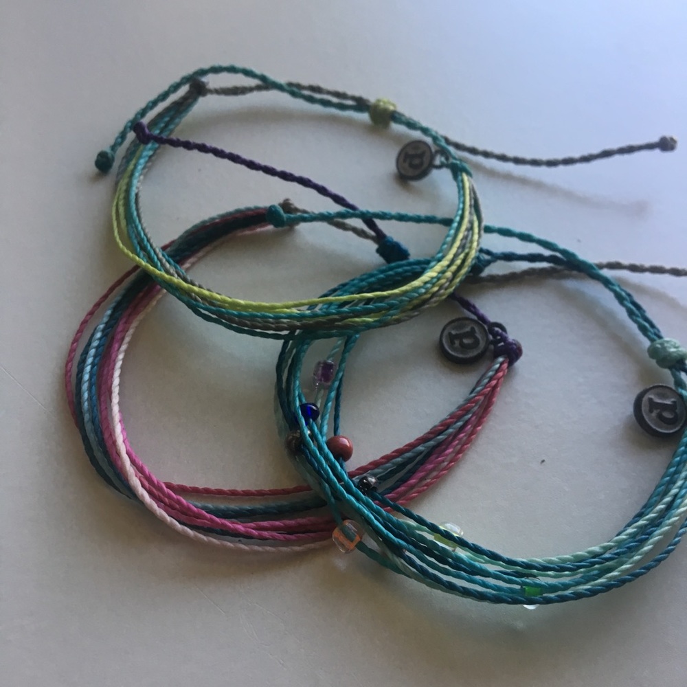 Three Puravida bracelets